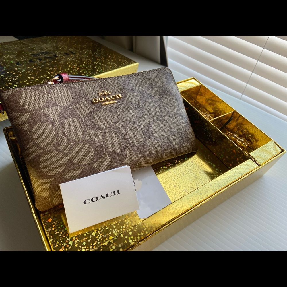 Brand new Coach Large Wristlet